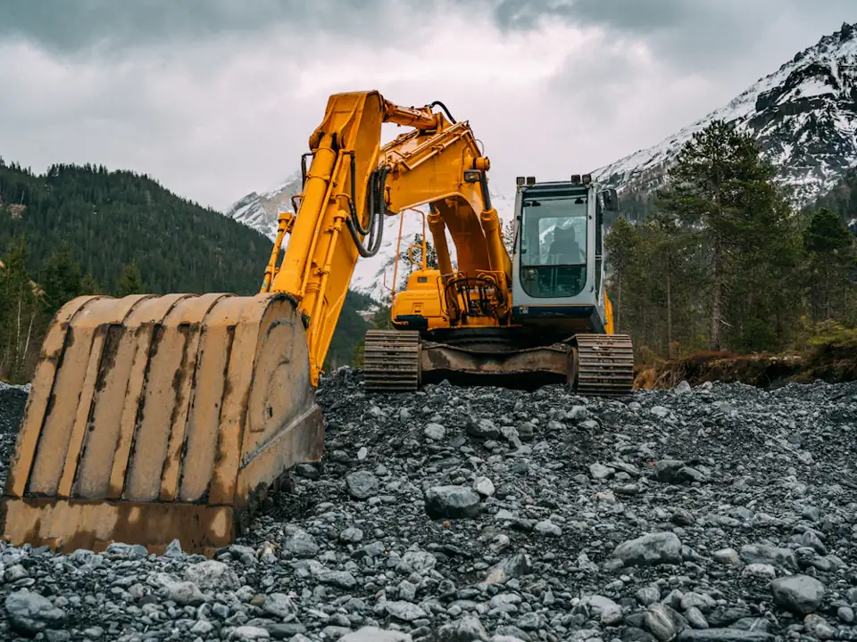 Yellow excavator on a work site